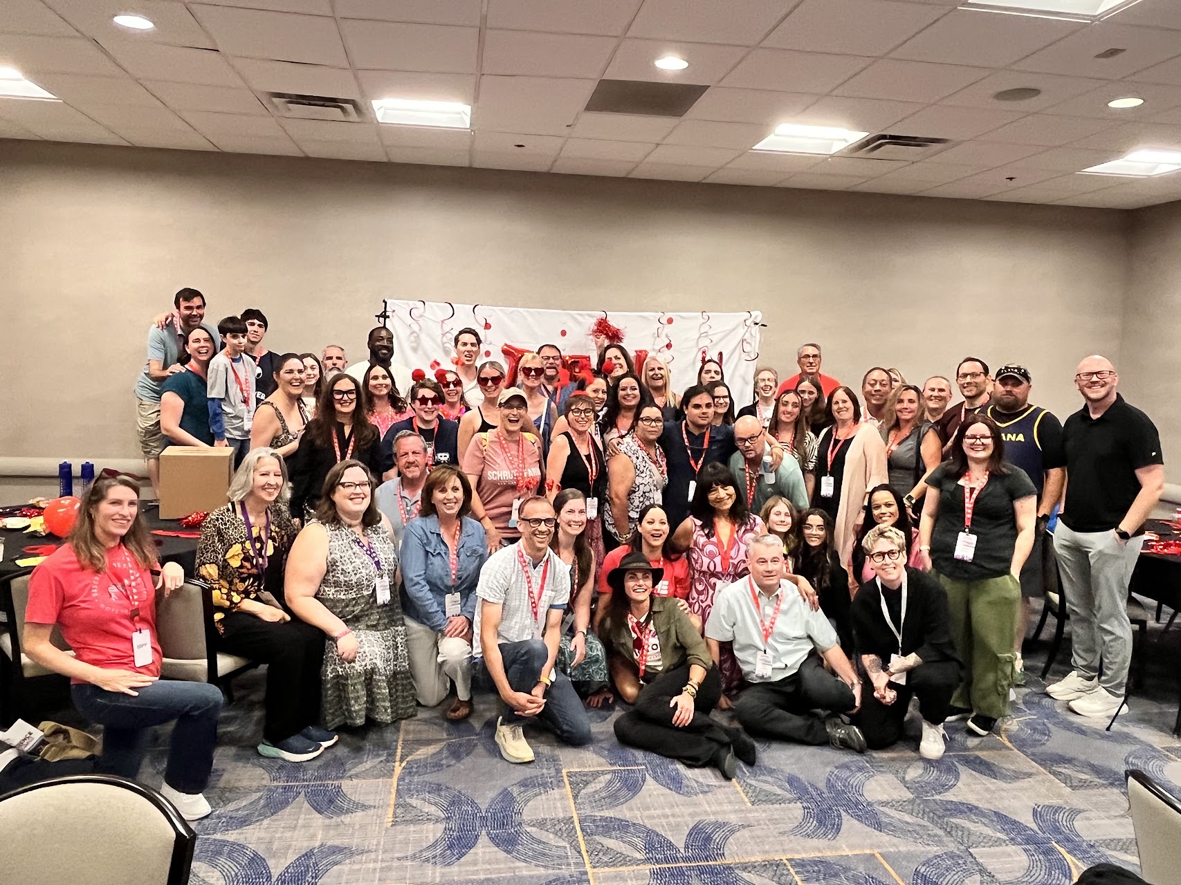 VEDS community group photo at a conference