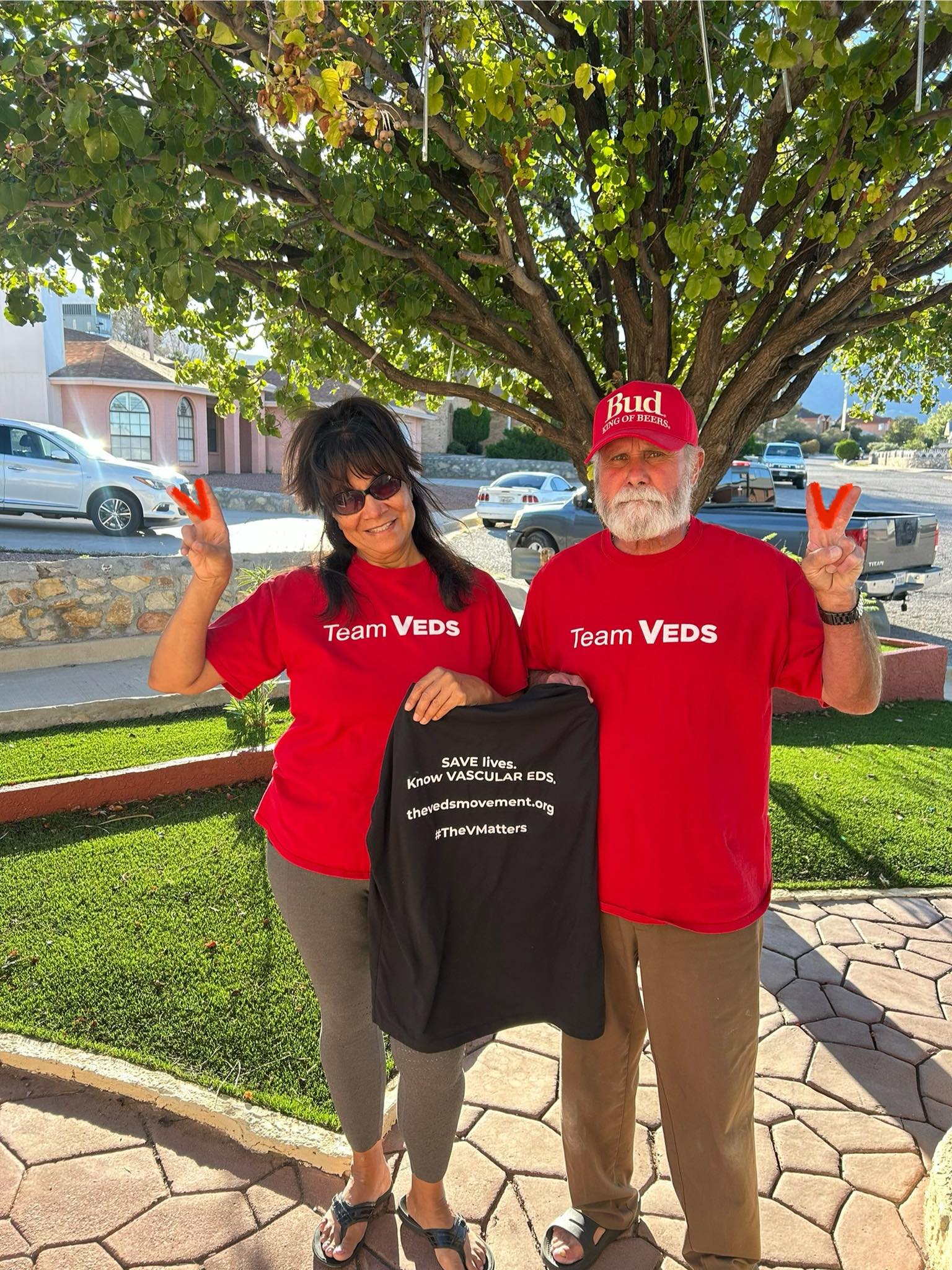 Community member Marin making the V sign